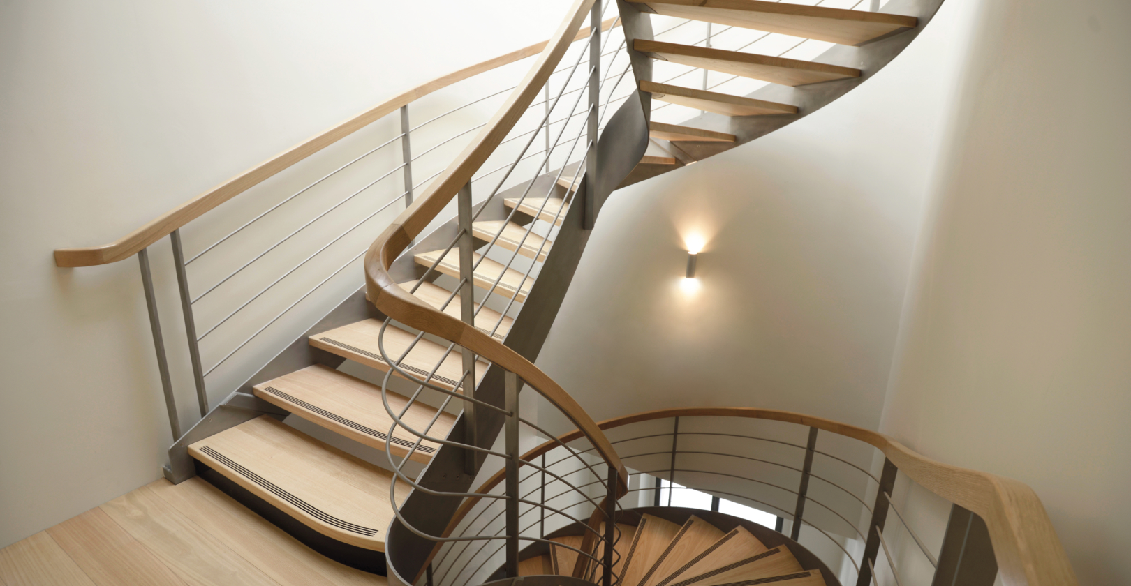 escalier balancé sur mesure avec limons main courante cintrée débillardée architecte françois jeanneau
